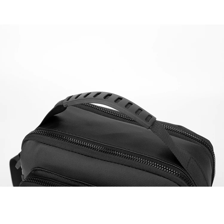 Durable crossbody bag, adjustable shoulder strap, multi-layer design, secure zipper - multifunctional storage bag