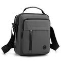 Durable crossbody bag, adjustable shoulder strap, multi-layer design, secure zipper - multifunctional storage bag