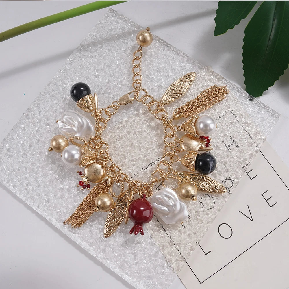 Eclectic Pomegranate Charm Bracelet Statement Accessory for Brunch Date Stylish Outfits Mixed Bead Bold Charm Jewelry