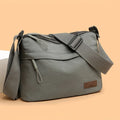 This large-capacity crossbody bag for women features a multi-zipper design and adjustable shoulder straps, making it suitable fo