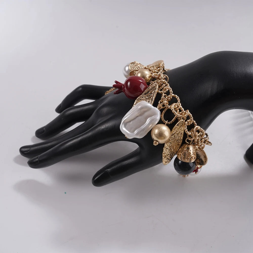 Eclectic Pomegranate Charm Bracelet Statement Accessory for Brunch Date Stylish Outfits Mixed Bead Bold Charm Jewelry